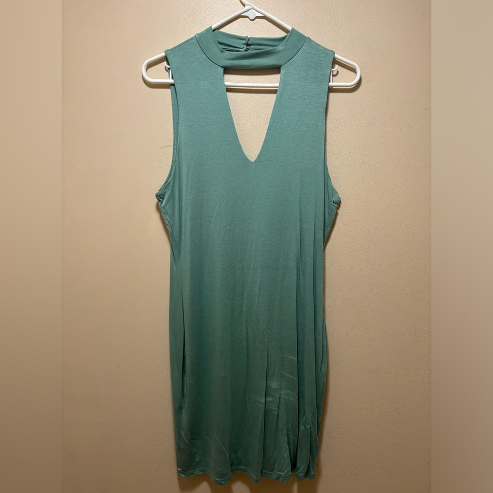 Light teal body con V neck dress